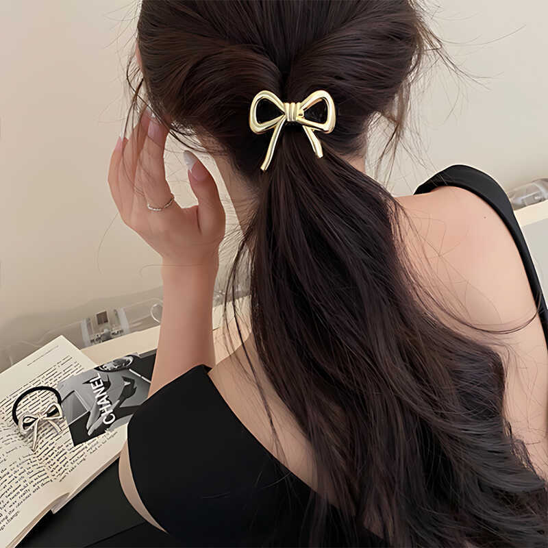 韓国の絶妙な金属弓ヘアロープ女性のためのポニーテールヘッドス - Silicone Band Women のレビューと価格